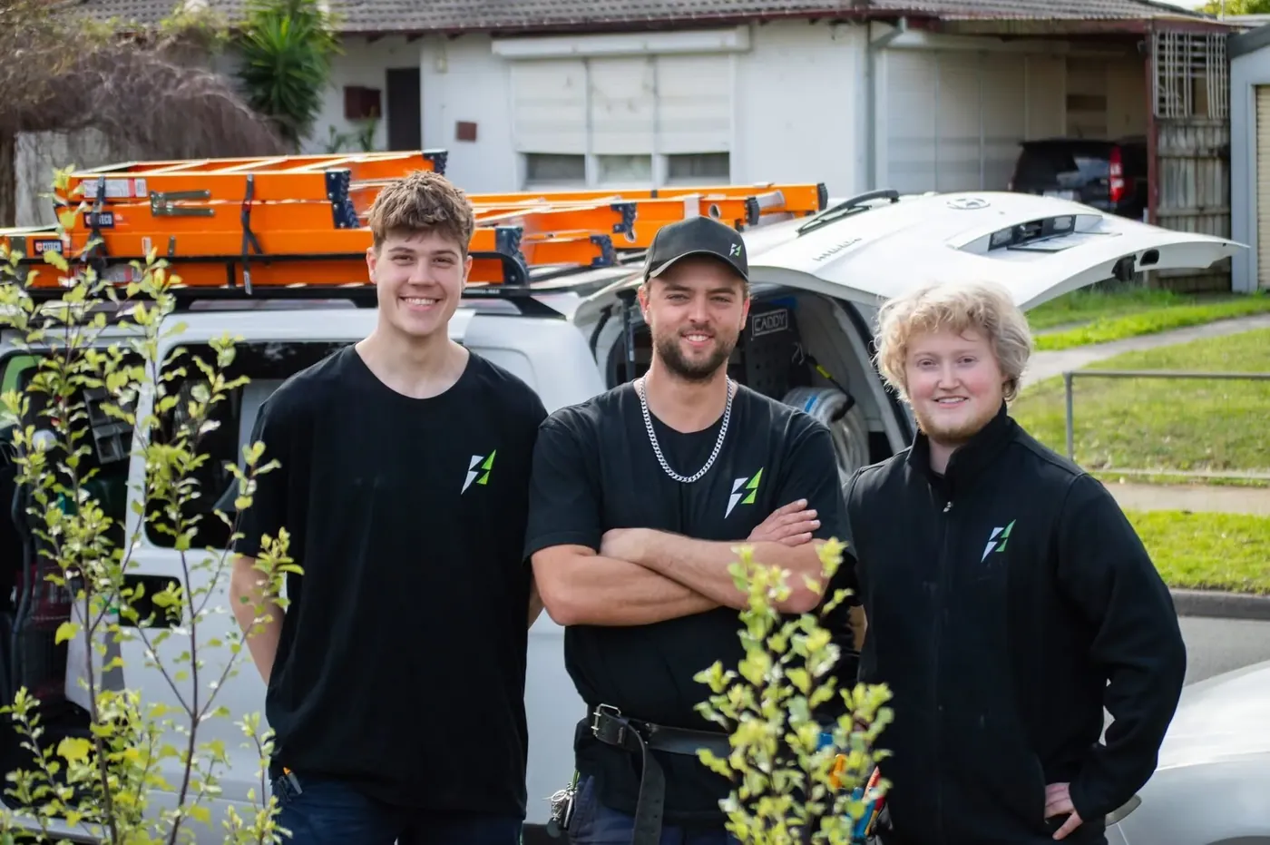The Streamline Solar team standing in front of their work van